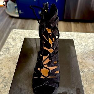 Beautiful lace up high heel shoes. Worn a few times but in great condition.
